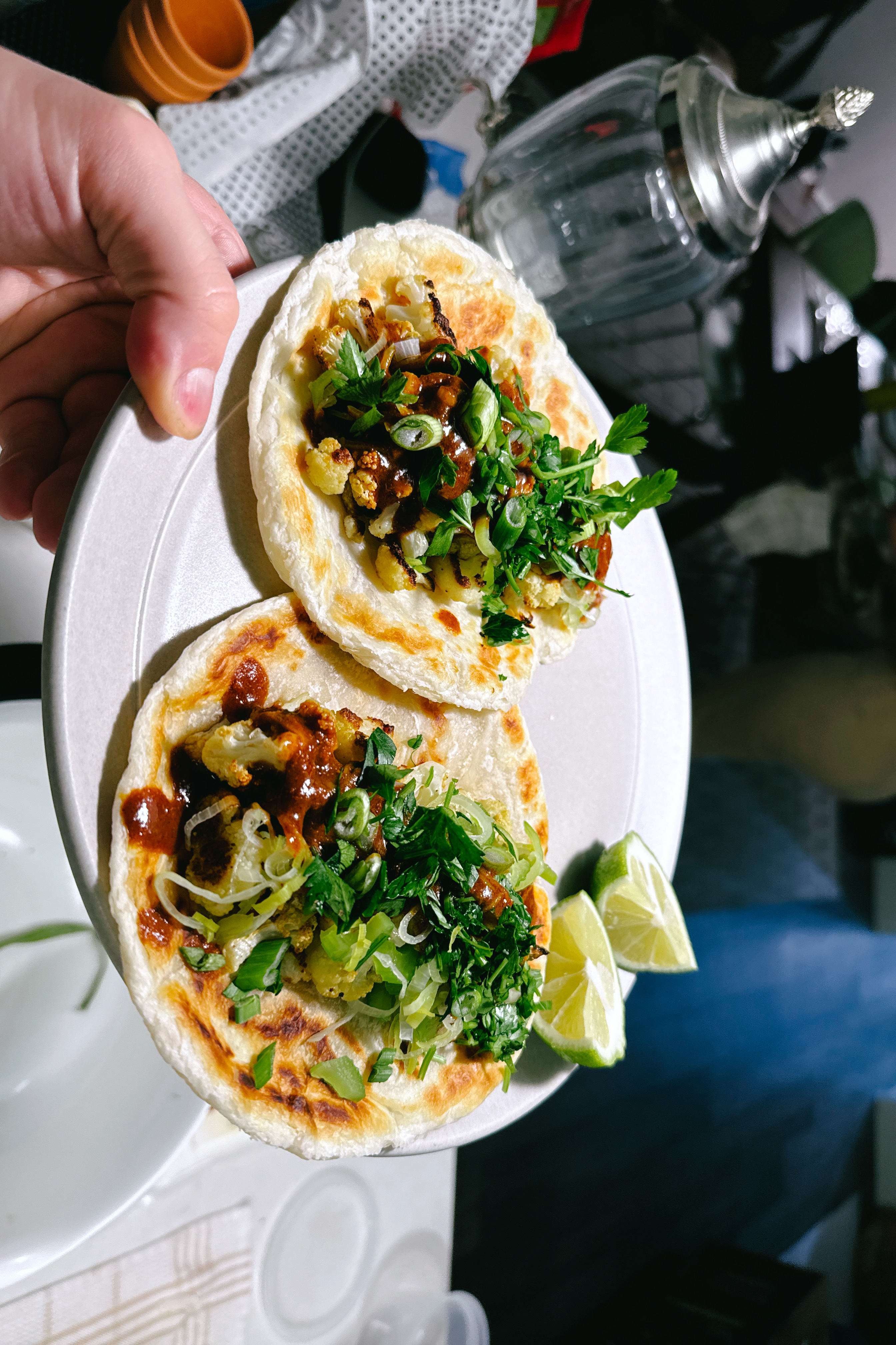 cover image for Sauteed Beans, Crispy Rice, Cauliflower Mole Paratha Tacos